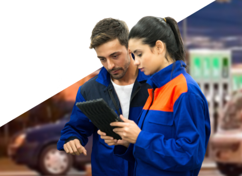 Man and woman addressing fuel supply chain operations.